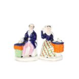A PAIR OF VICTORIAN STAFFORDSHIRE FIGURES