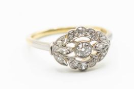 AN 18CT YELLOW GOLD AND PLATINUM DIAMOND RING