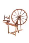 A VICTORIAN PINE SPINNING WHEEL