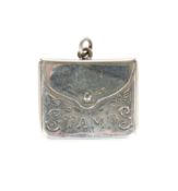 AN EDWARDIAN SILVER STAMP CASE