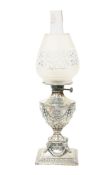 A LATE VICTORIAN SILVER OIL LAMP