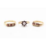 THREE YELLOW GOLD AND GEM SET RINGS