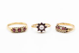 THREE YELLOW GOLD AND GEM SET RINGS