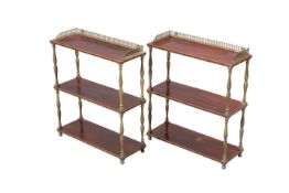 A PAIR OF REGENCY MAHOGANY AND BRASS THREE-TIER HANGING SHELVES