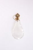 A FRENCH 18 CARAT GOLD-MOUNTED ROCK CRYSTAL SCENT BOTTLE