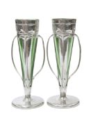 A PAIR OF LIBERTY & CO TUDRIC PEWTER AND GREEN GLASS VASES, DESIGNED BY ARCHIBALD KNOX