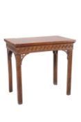 A MAHOGANY SIDE TABLE IN CHIPPENDALE STYLE