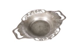 A TUDRIC PEWTER TWIN-HANDLED DISH, c. 1900