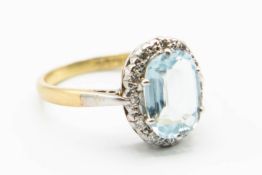 AN AQUAMARINE AND DIAMOND RING