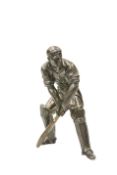 A PATINATED METAL FIGURE OF A CRICKETER AT THE STUMP