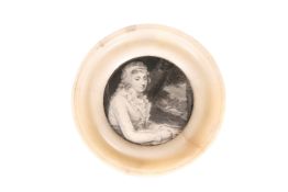 AN EARLY 19TH CENTURY POT LID