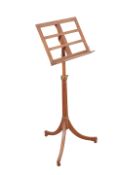 A REGENCY STYLE OAK RISE AND FALL MUSIC STAND