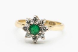 AN 18CT YELLOW GOLD, EMERALD AND DIAMOND RING