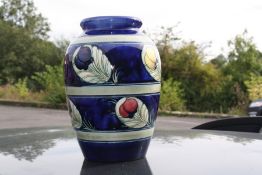 A WILLIAM MOORCROFT POTTERY VASE