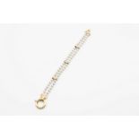 A CONTEMPORARY CULTURED PEARL AND DIAMOND BRACELET