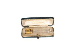 A SMALL FRENCH DIAMOND-SET GOLD AND CUT-GLASS SCENT BOTTLE, MID-19th CENTURY