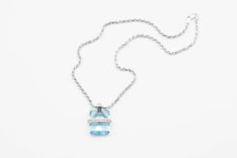 A CONTEMPORARY BLUE TOPAZ PENDANT