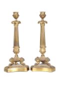 A PAIR OF GILT-METAL COLUMNAR LAMP BASES IN THE EMPIRE TASTE