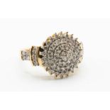 A 14CT YELLOW GOLD AND DIAMOND RING