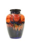 A WALTER MOORCROFT FLAMBE POTTERY VASE