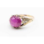 A BURMESE PINK SAPPHIRE AND DIAMOND RING