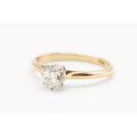 AN 18CT YELLOW GOLD AND DIAMOND RING