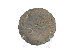 A CHINESE BRONZE PLATE