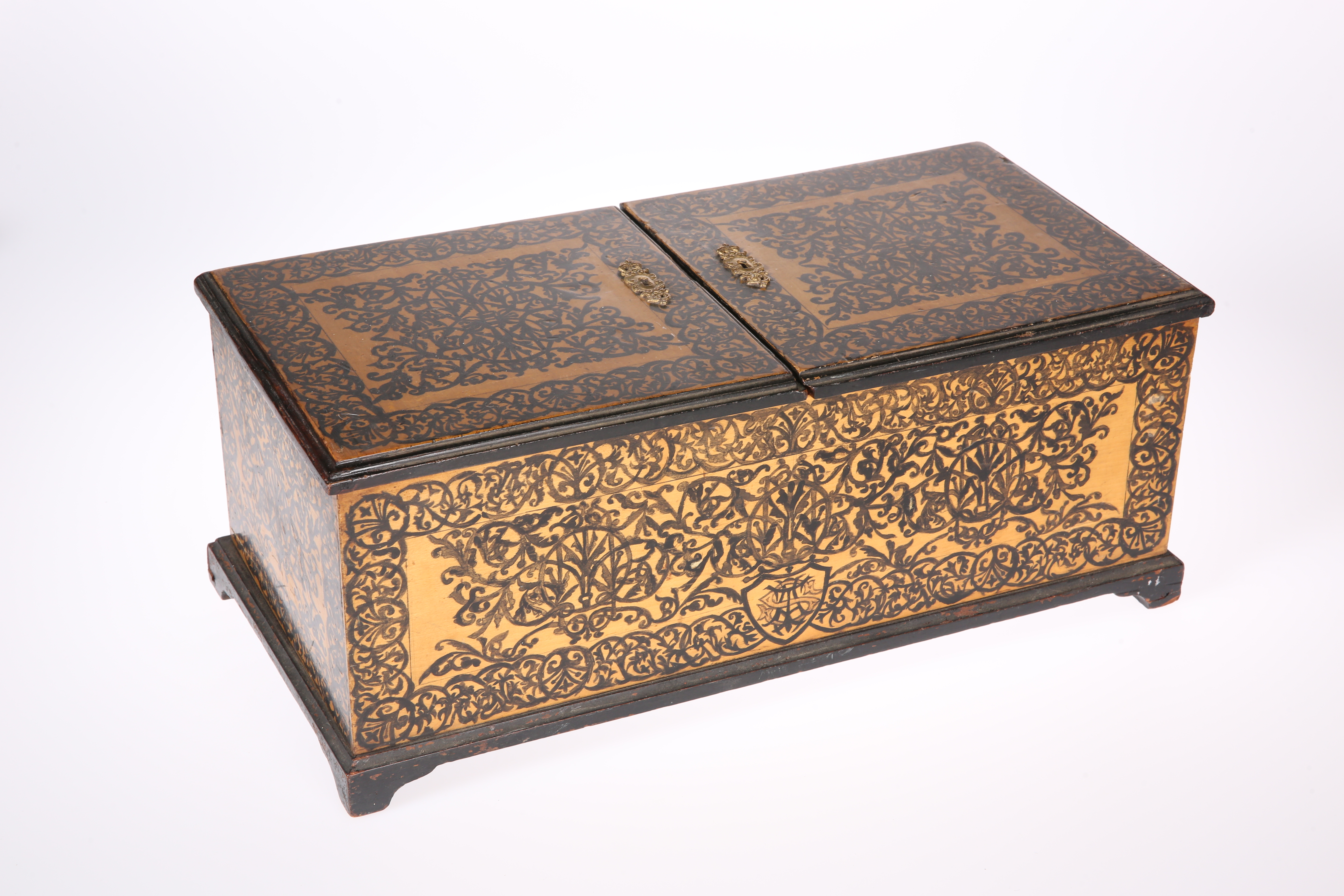 A LARGE 19TH CENTURY POKERWORK TEA CADDY