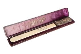 HUNTING INTEREST: A LARGE VICTORIAN SILVER-MOUNTED IVORY PAGE TURNER