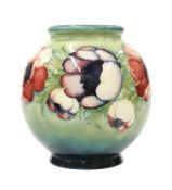 A WALTER MOORCROFT POTTERY VASE