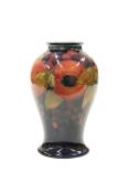 A WILLIAM MOORCROFT POTTERY VASE