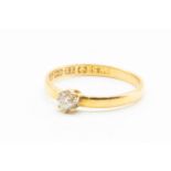 A 22CT YELLOW GOLD AND DIAMOND SET RING