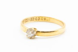 A 22CT YELLOW GOLD AND DIAMOND SET RING