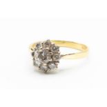 AN 18CT YELLOW GOLD AND DIAMOND RING