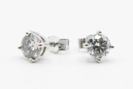 A PAIR OF DIAMOND STUD EARRINGS