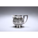 AN INDIAN SILVER CREAM JUG, c. 1900