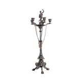 A CONTINENTAL PATINATED BRONZE FOUR LIGHT CANDELABRUM IN THE EMPIRE TASTE