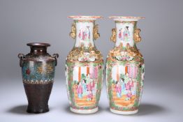 A PAIR OF CANTONESE FAMILLE ROSE VASES