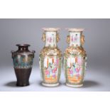 A PAIR OF CANTONESE FAMILLE ROSE VASES