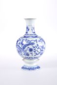 A CHINESE BLUE AND WHITE ROTATING VASE, IN QIANLONG STYLE