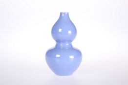 A SMALL CHINESE PALE BLUE DOUBLE GOURD VASE