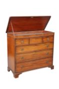 A REGENCY MAHOGANY CHEST OF DRAWERS WITH HINGED TOP