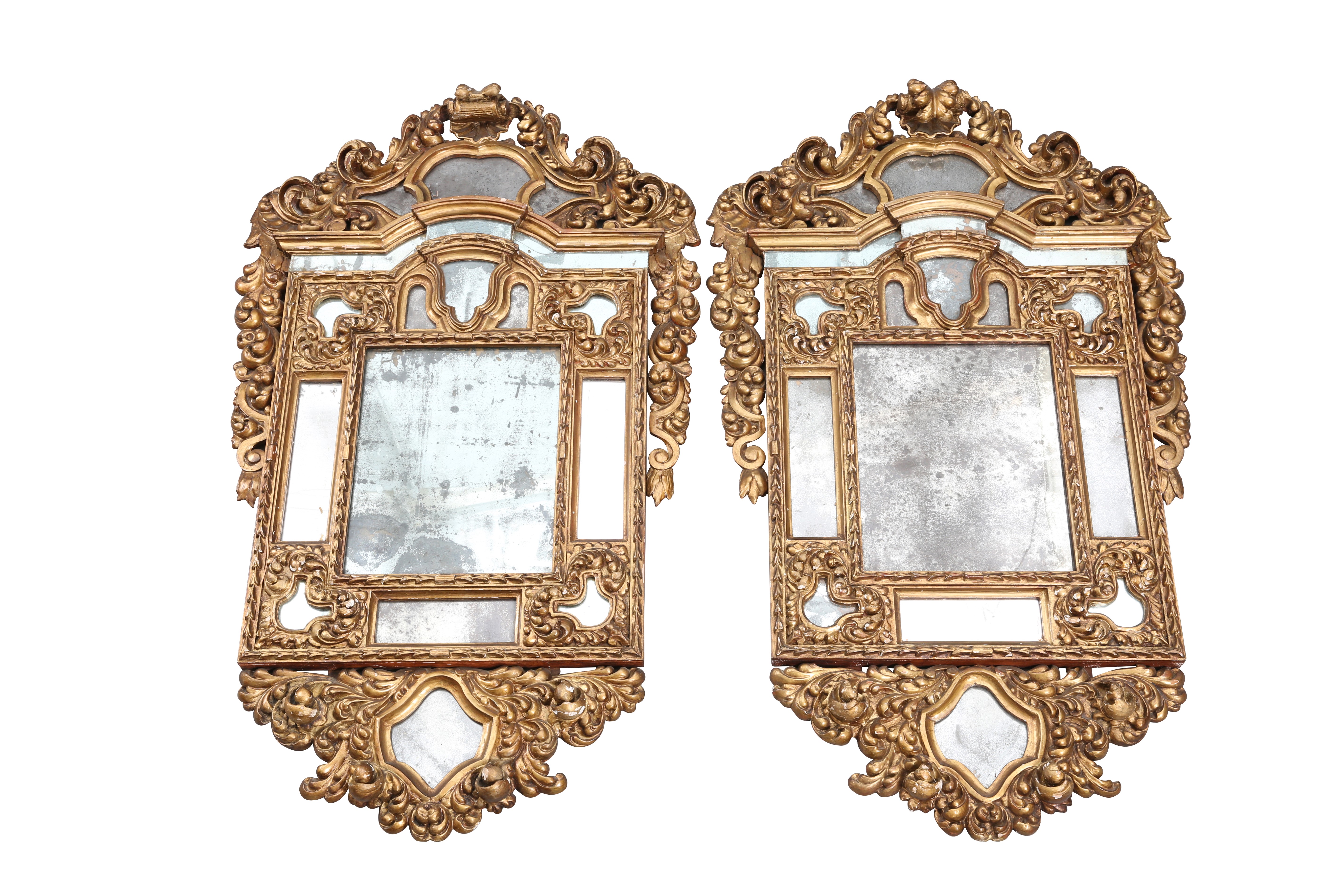 A HANDSOME PAIR OF BAROQUE REVIVAL GILTWOOD MIRRORS