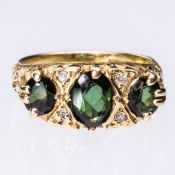 A GREEN TOURMALINE RING