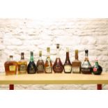 10 BOTTLES (INCLUDING LITRE BOTTLES) ASSORTED SPIRITS AND LIQUEURS FROM 1970’S / 1980’S