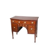 A SMALL REGENCY MAHOGANY BOW-FRONT SIDEBOARD