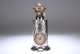 A LATE VICTORIAN SILVER OIL LAMP BASE, INSET WITH A CLOCK, JAMES DEAKIN & SONS, SHEFFIELD 1889