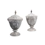 A PAIR OF GEORGE III LEAD URNS, C.1800