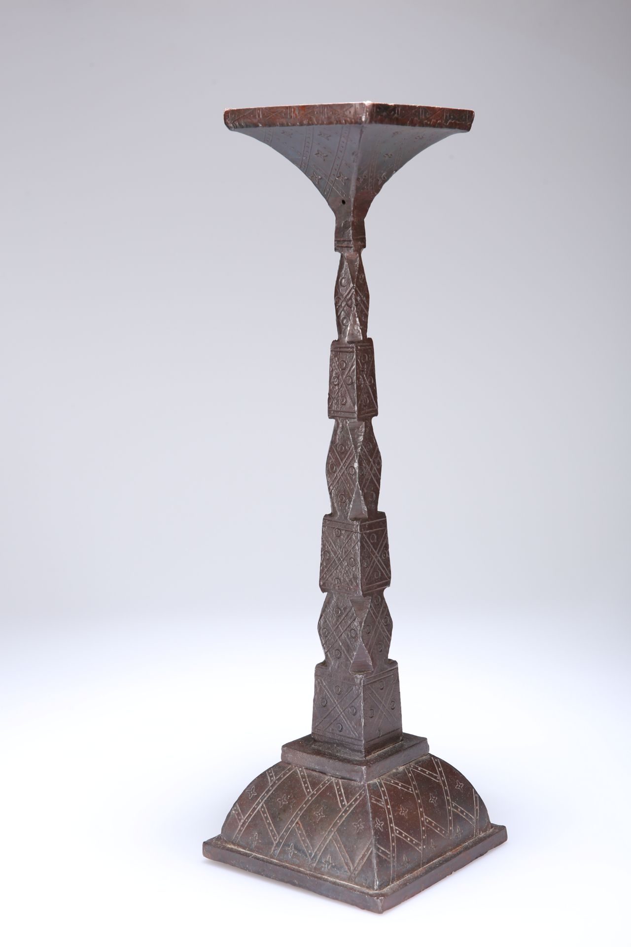AN IRON CANDLE STAND