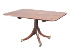 A REGENCY MAHOGANY TILT-TOP BREAKFAST TABLE